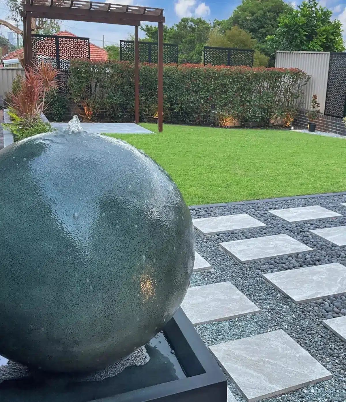 Outdoor landscaping transformation in Sydney with deck and garden area