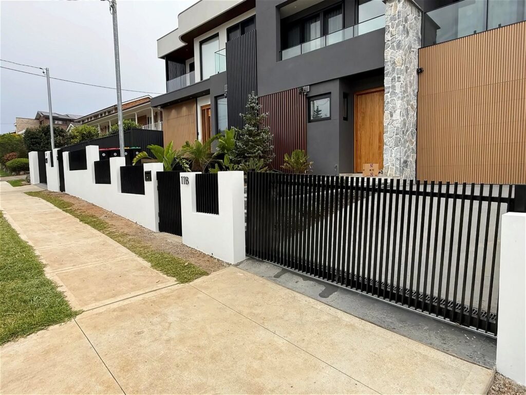 Automatic sliding gate and rendered front wall, Carlingford