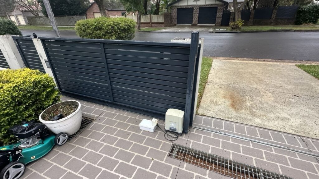Grey aluminium slat automatic sliding gate